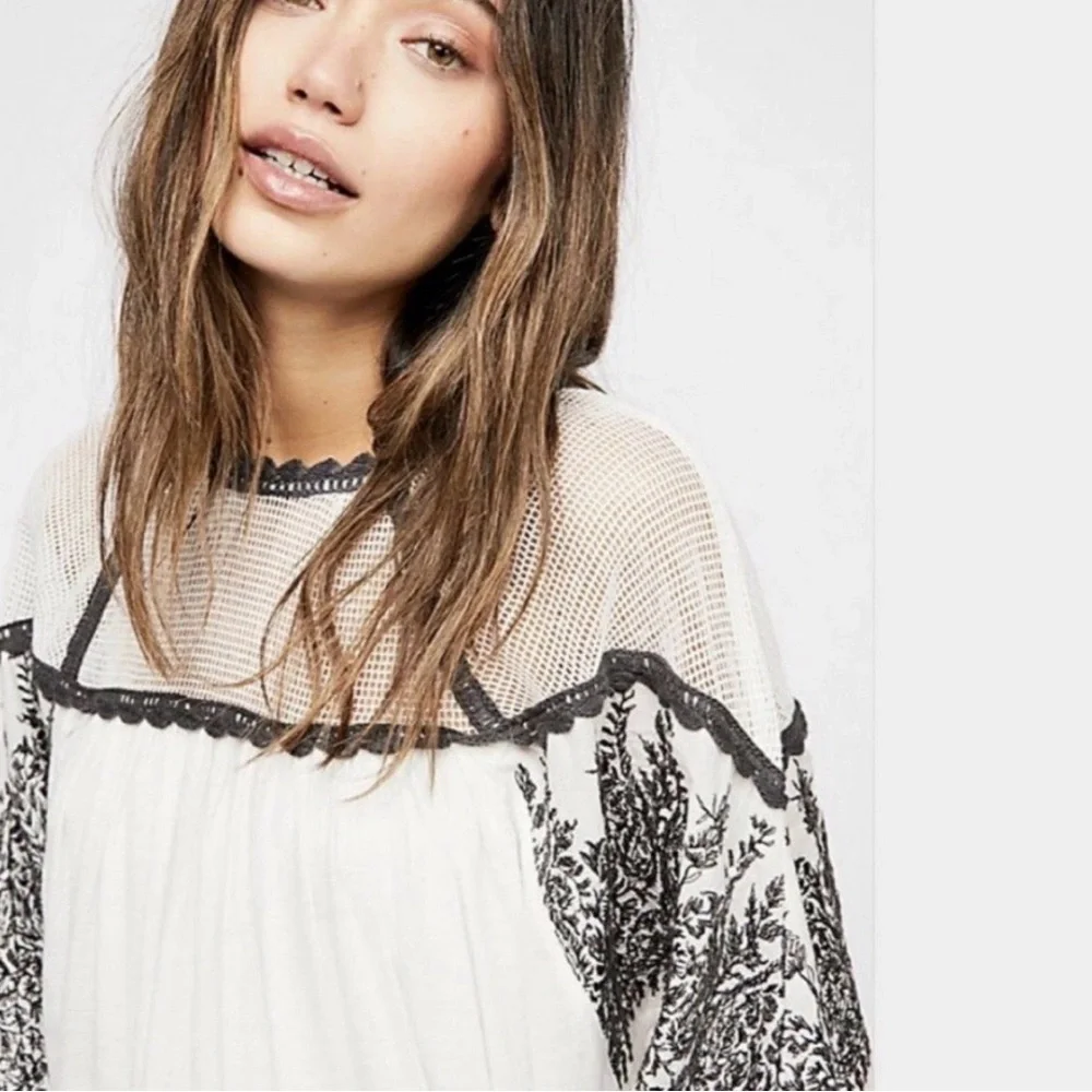 Free People Carly Embroidered Flowy Boho Style Top With A Cropped Bubble Hem